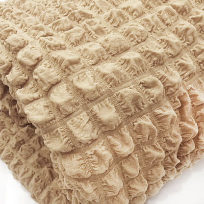 Copridivano elasticizzato con tessuto bolle beige
