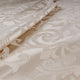 Tessuto raso ghirigori beige