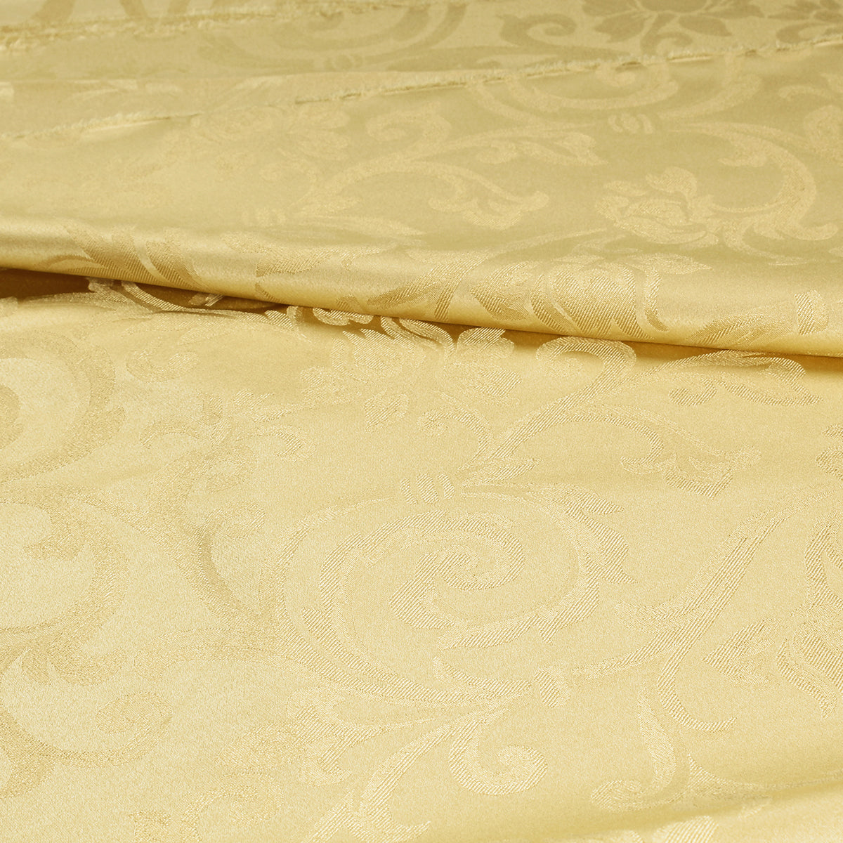 Tessuto raso ghirigori oro