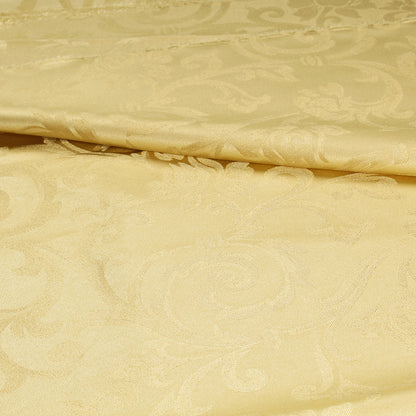 Tessuto raso ghirigori oro