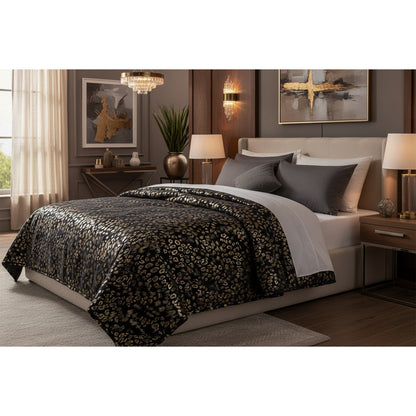 Piumone animalier oro in velluto nero