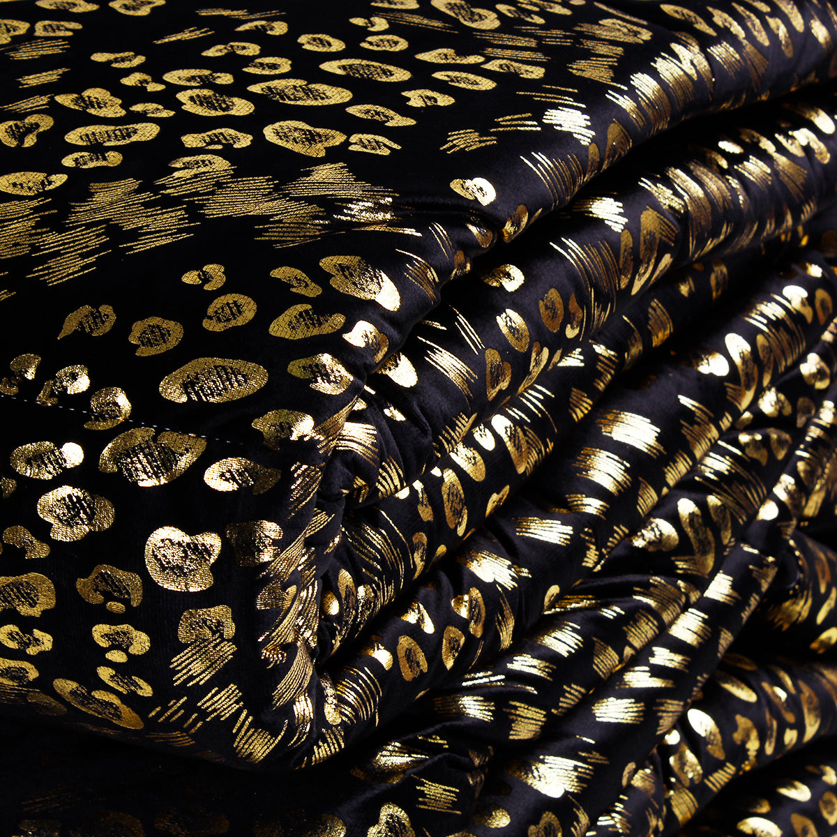 Piumone animalier oro in velluto nero