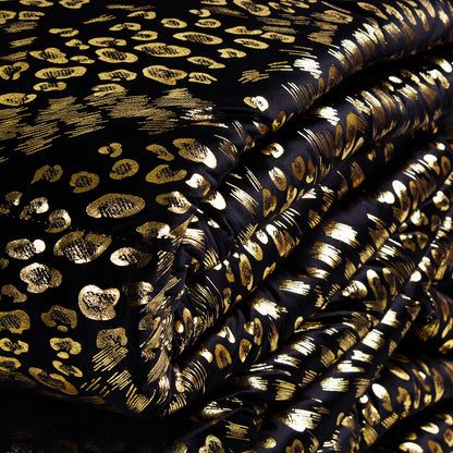 Piumone animalier oro in velluto nero